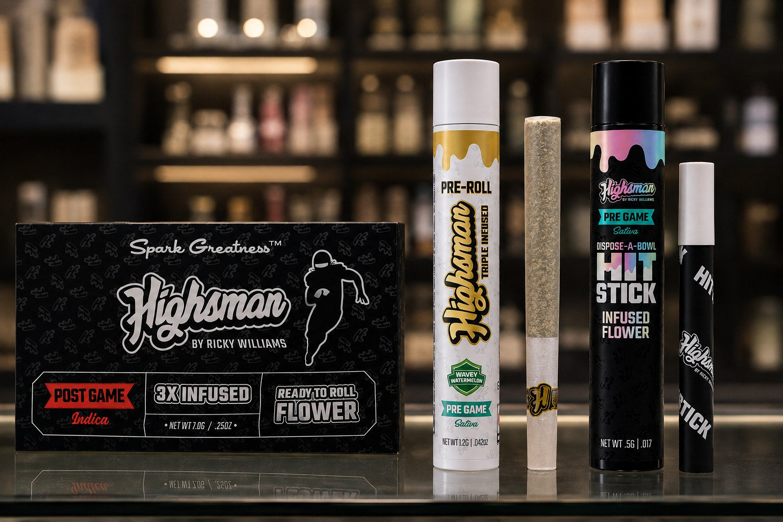 Highsman Post Game flower, Triple Threat pre-roll and Hit Stick on a dispensary counter.
